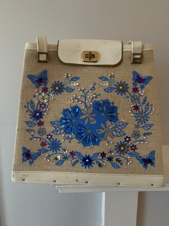 Vintage handbag blue floral jewels on white canvas