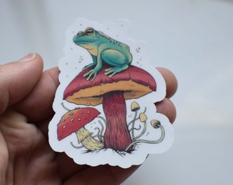 Frog Relaxing On Mushroom Die Cut Vinyl Laminated Water Resistant Sticker