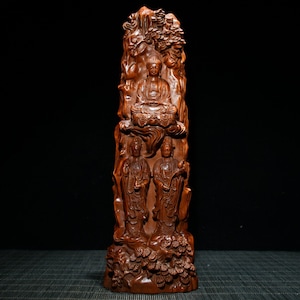 A folk collection of hand-carved boxwood  statues