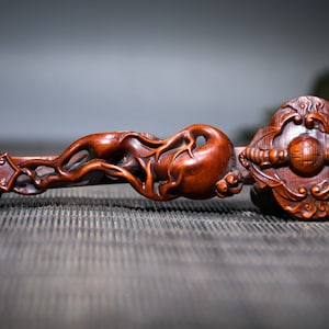 A folk collection of hand-carved boxwood  statues