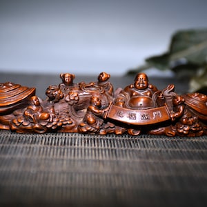 A folk collection of hand-carved boxwood  statues