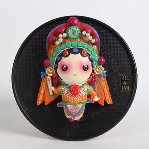 Hand-painted lacquer mask of Hua Mu Lan statue