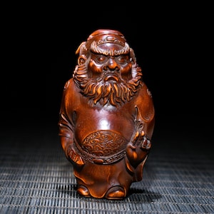A folk collection of hand-carved boxwood  statues