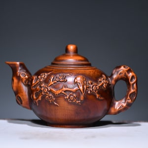 A folk collection of hand-carved boxwood  statues
