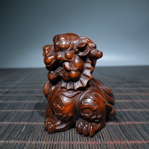 A folk collection of hand-carved boxwood  statues