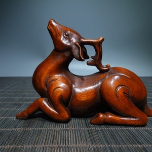 A folk collection of hand-carved boxwood  statues