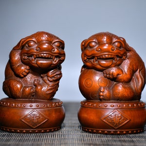 A folk collection of hand-carved boxwood  statues