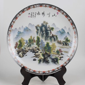 A folk collection of hand-painted ceramic plates