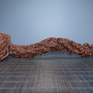 A folk collection of hand-carved boxwood  statues
