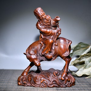 A folk collection of hand-carved boxwood  statues