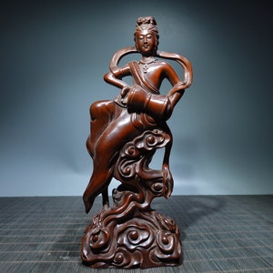A folk collection of hand-carved boxwood  statues