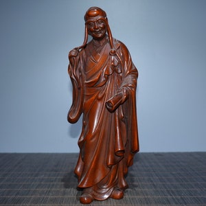 A folk collection of hand-carved boxwood  statues