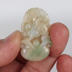 Folk collection of hand-carved jade pendants