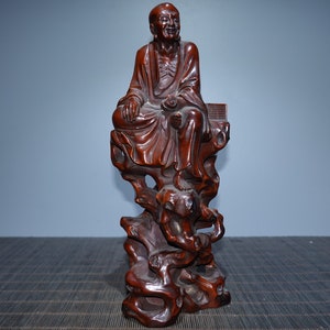 A folk collection of hand-carved boxwood  statues