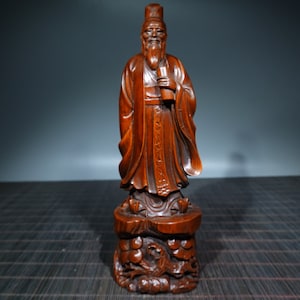 A folk collection of hand-carved boxwood  statues