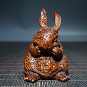 A folk collection of hand-carved boxwood  statues