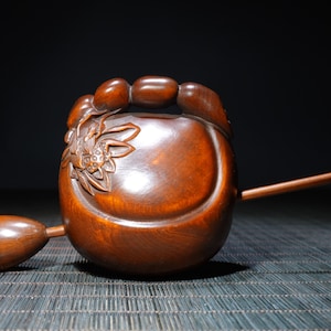 A folk collection of hand-carved boxwood  statues
