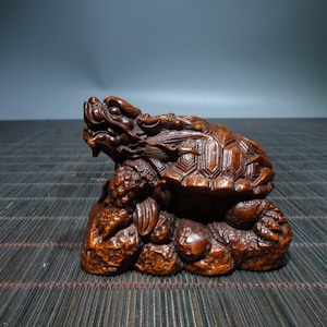 A folk collection of hand-carved boxwood  statues