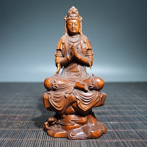 A folk collection of hand-carved boxwood  statues