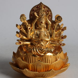 Folk collection of hand-carved alloy Buddha statues