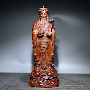A folk collection of hand-carved boxwood  statues