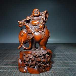 A folk collection of hand-carved boxwood  statues
