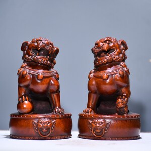 A folk collection of hand-carved boxwood  statues