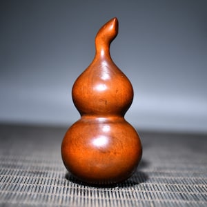A folk collection of hand-carved boxwood  statues