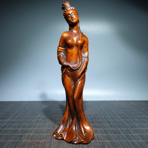 A folk collection of hand-carved boxwood  statues