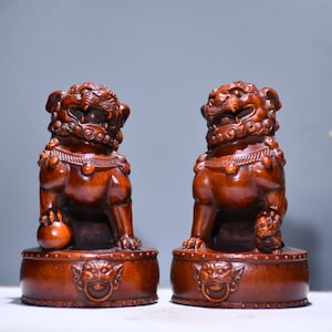 A folk collection of hand-carved boxwood  statues