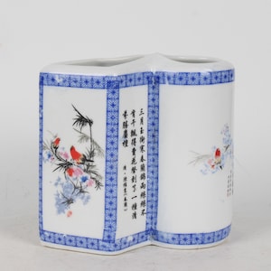 Hand-painted blue and white porcelain pen holder from a folk collection