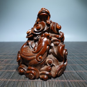 A folk collection of hand-carved boxwood  statues