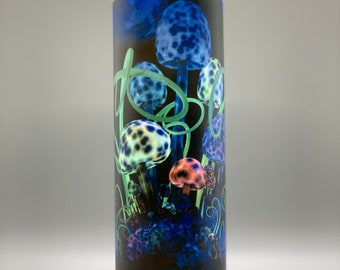 Glow in the Dark Mushrooms tumbler. Neon, vibrant, colors are featured on 20oz skinny travel cup. Keeps beverages hot or cold.