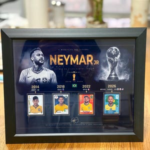May include: A black framed print featuring a portrait of Neymar Jr. and a graphic of the World Cup trophy. Below are four football trading cards representing the years 2014, 2018, 2022, and 2026, each labelled with the host country and the Brazilian flag.