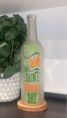 St Patrick’s Day Decor. Everyone is Irish on St Pat’s Day. St Patrick’s Day Lights. Wine Bottle Lights. Lighted St Patrick Day Wine Bottles.