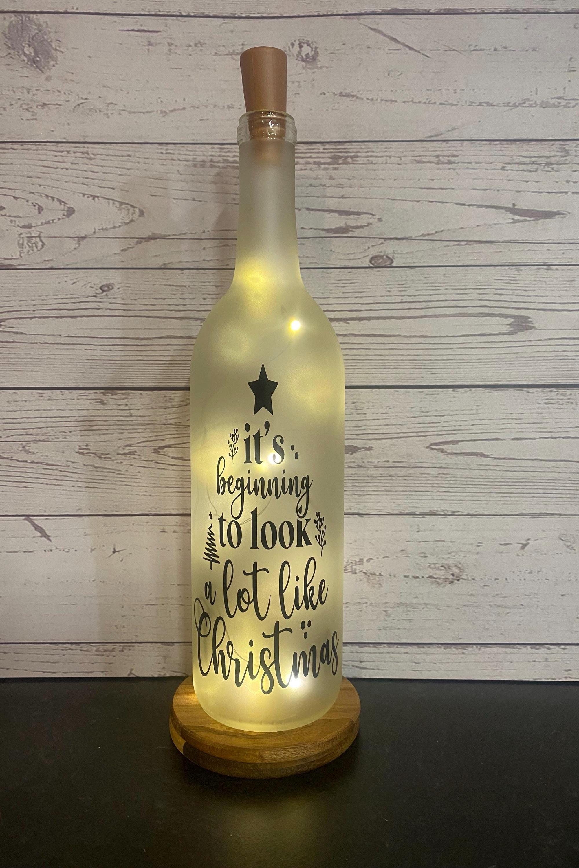 It’s beginning to look a lot like Christmas Lighted wine bottle, decorative wine bottle, teacher gift ,christmas gift, Christmas decor - Image 1