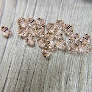 Genuine Swarovski 5328 Silk crystals, Swarovski bicone Silk crystals 4mm, 4mm bicone Silk crystal beads, limited quantity, one pk left