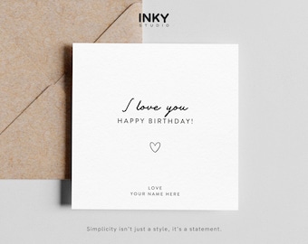 Op de afbeelding: Een witte kaart met zwarte tekst die "I love you Happy Birthday!" zegt met een klein hartje onder de tekst. De tekst "LOVE YOUR NAME HERE" staat onderaan de kaart.