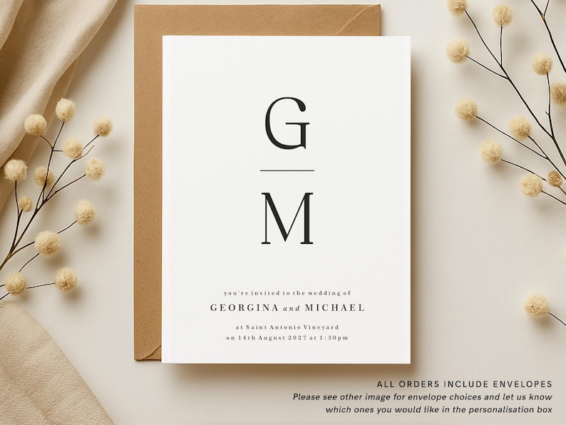May include: A minimalist wedding invitation with a black and white design. The invitation features the couple's initials, "G" and "M", in a simple, elegant font. The text reads "you're invited to the wedding of GEORGINA and MICHAEL at Saint Antonis Vineyard on 14th August 2027 at 1:30pm".