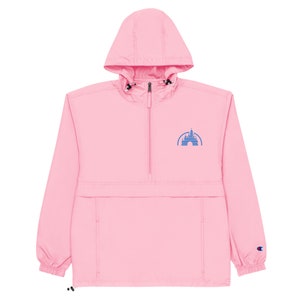 May include: A pink hooded windbreaker with a blue embroidered castle logo on the front.