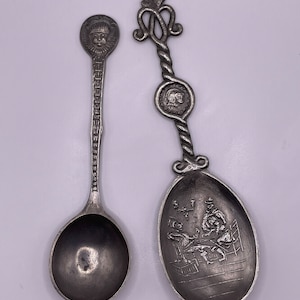 Vintage Two Decorative Souvenir spoons. White metal. Rein Zinn Pewter