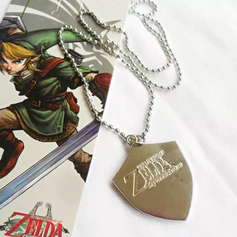 The Legend of Zelda Necklace, Keychain pendant, Zelda Locket Hylian Shield pendant, Anniversary gift, Clothing decor image 4