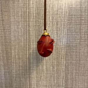 Collana periferica del gioco Berserk creativo, collana fatta a mano con l'uovo del re, collana con ciondolo cosplay anime unica, regalo di Halloween immagine 4