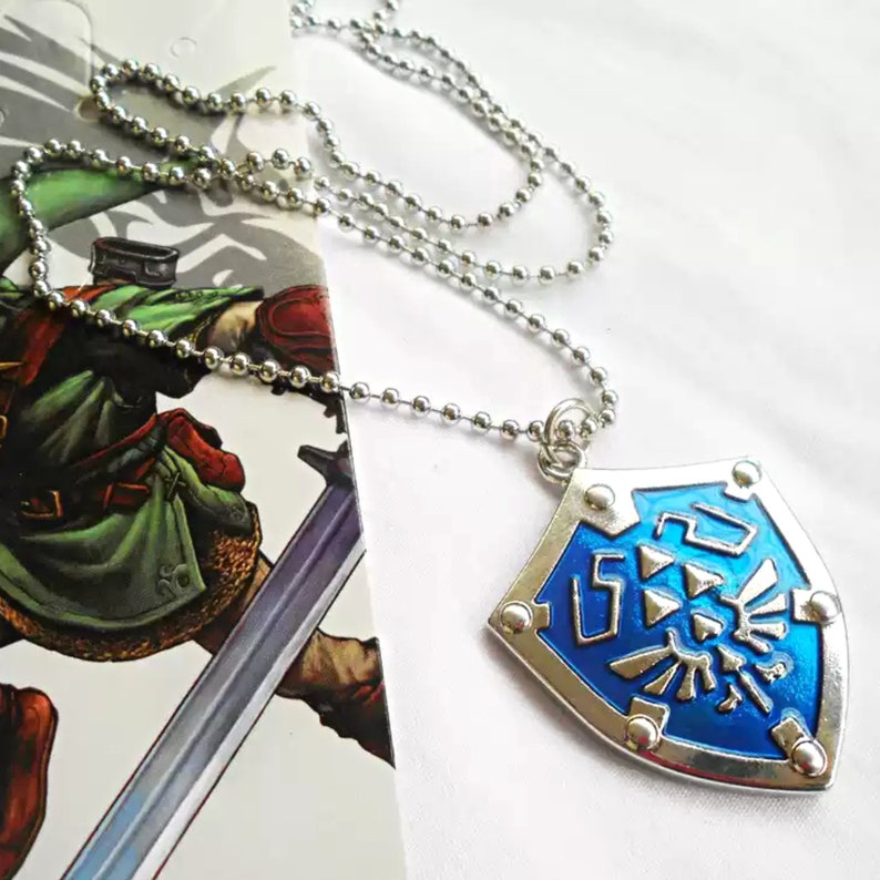 The Legend of Zelda Necklace, Keychain pendant, Zelda Locket Hylian Shield pendant, Anniversary gift, Clothing decor image 1