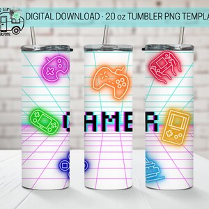 May include: Three 20 oz tumbler PNG templates with a white background and a grid pattern. The tumblers feature neon-colored gamer graphics, including a joystick, a handheld game console, and the word "GAMER" in pixelated letters.