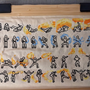 May include: Cross-stitch embroidery of characters from the video game Street Fighter. The characters are shown performing various fighting moves, including fire and lightning attacks. The Japanese text on the left side of the image reads "制火術", which translates to "Fire Control Technique".