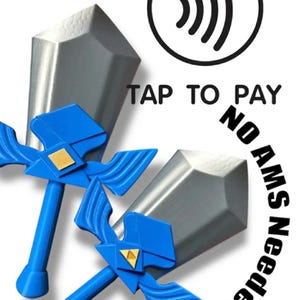 May include: Two blue and silver toy swords with gold accents, resembling a video game weapon. The image includes the text "TAP TO PAY" and "NO AMS Needed" with a contactless payment symbol.