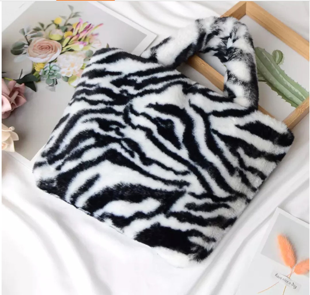 Fuzzy zebra bag hotsell