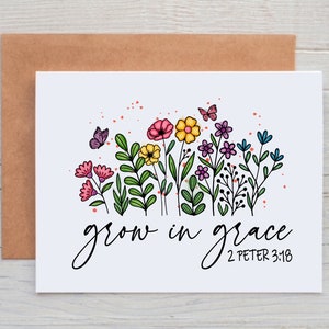 May include: A white card with a floral design and the text "grow in grace 2 PETER 3:18". The flowers are pink, yellow, purple, and blue. There are two butterflies.