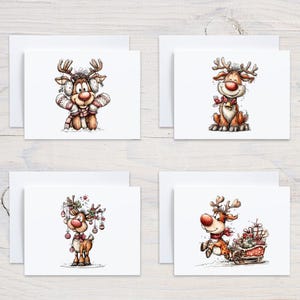 May include: Set of four Christmas greeting cards featuring whimsical reindeer illustrations. Each card showcases a different reindeer design, including one with earmuffs and a scarf, and another pulling a sleigh filled with gifts. The cards are on a white background.